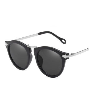NIRMAI Female metal arrows sunglasses