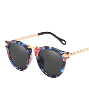 NIRMAI Female metal arrows sunglasses